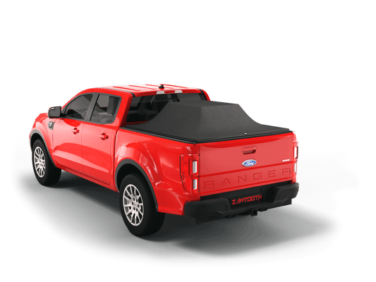 A red Ford Ranger pickup truck shown from a rear three-quarter angle, fitted with a black tonneau-style bed cover, on a clean white background.