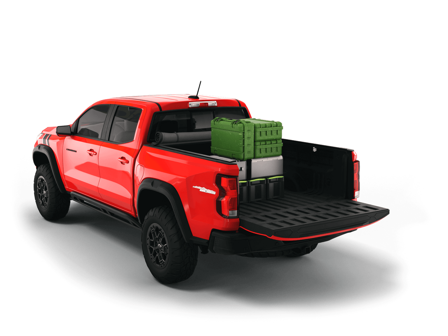 Red Chevrolet Colorado / GMC Canyon with gear in the truck bed and the Sawtooth Stretch tonneau cover rolled up at cab
