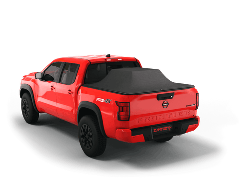 Red 2023 Nissan Frontier 6' Bed with loaded and expanded Sawtooth Stretch pickup truck bed cover