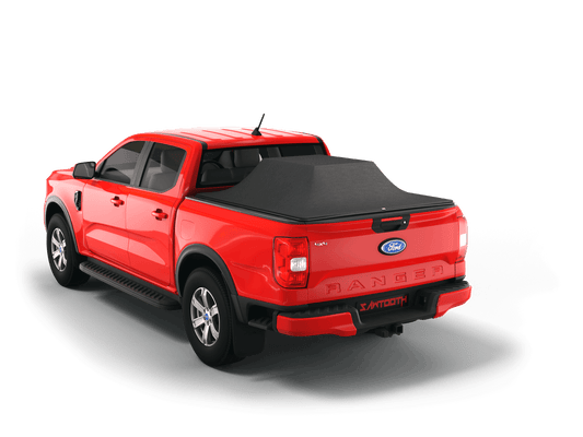 Red Ford Ranger with loaded and expanded Sawtooth Stretch pickup truck bed cover