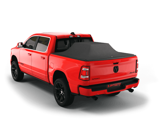 Red Ram 2500 with loaded and expanded Sawtooth Stretch pickup truck bed cover