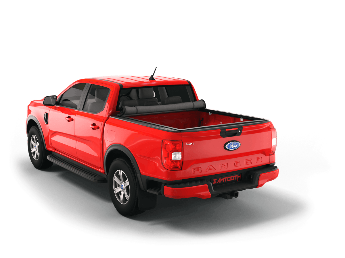 A red Ford Ranger pickup truck with a rolled up Sawtooth STRETCH truck bed cover shown from a rear three-quarter angle on a clean white background.