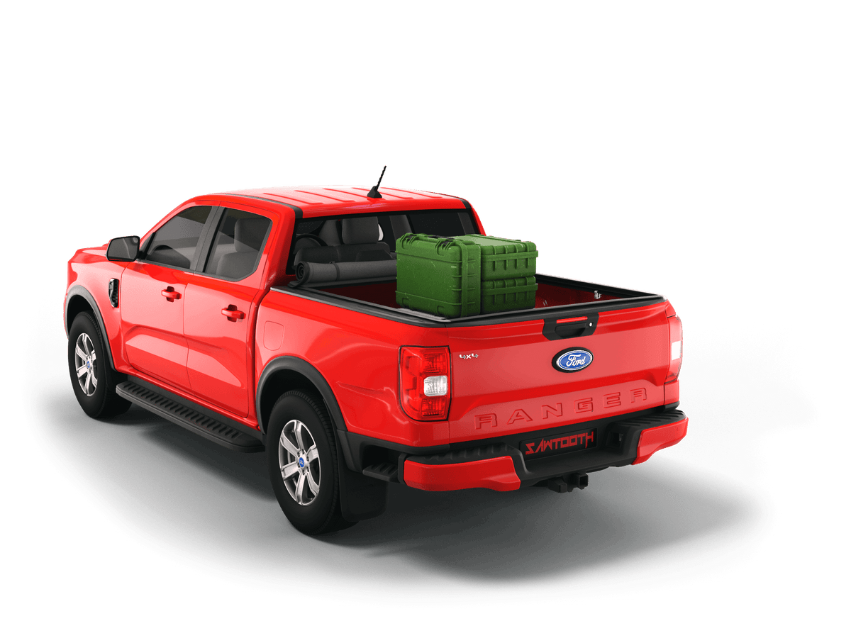 A red Ford Ranger pickup truck shown from a rear three-quarter angle with a rolled up Sawtooth STRETCH truck bed cover on a clean white background, with a green storage case in the bed.