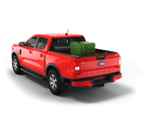 Load image into Gallery viewer, Red 2024 Ford Ranger 5&#39; Bed with gear in the truck bed and the Sawtooth Stretch tonneau cover expanded over cargo load
