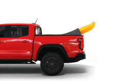 Load image into Gallery viewer, Red 2025 Chevrolet Colorado 5&#39; 2&quot; Bed / GMC Canyon 5&#39; 2&quot; Bed with yellow kayak under sawtooth stretch truck bed cover

