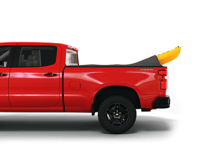 Red Chevrolet Silverado 1500 / GMC Sierra 1500 with yellow kayak under sawtooth stretch truck bed cover