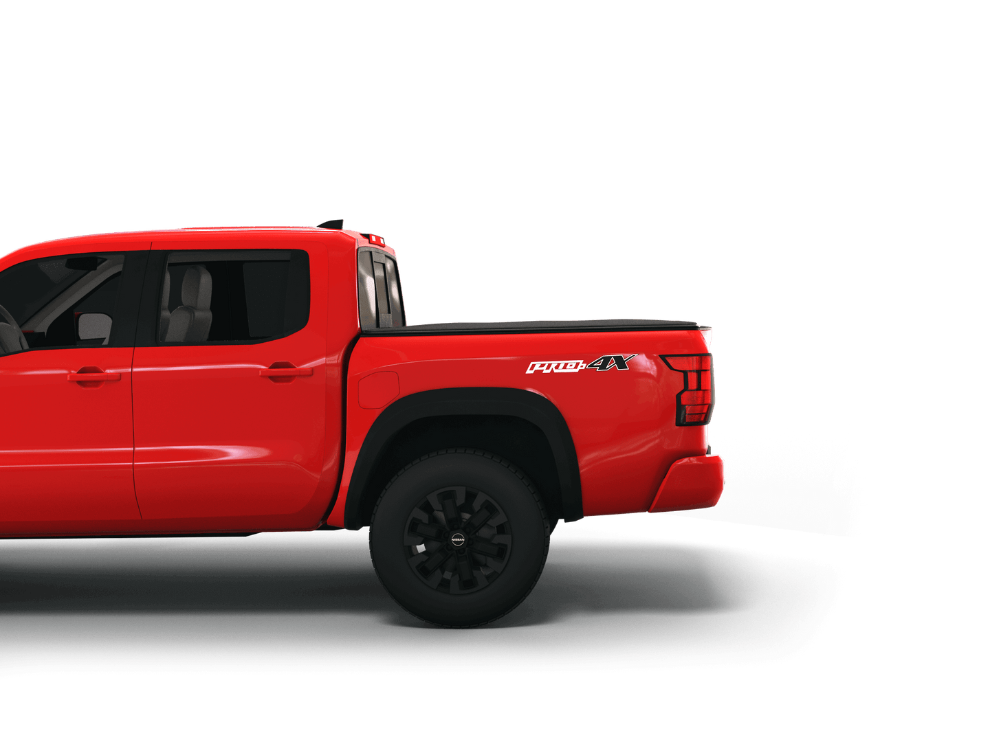 Red Nissan Frontier with Sawtooth Stretch expandable tonneau cover laying flat