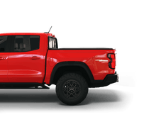 Load image into Gallery viewer, Red 2023 Chevrolet Colorado 5&#39; 2&quot; Bed / GMC Canyon 5&#39; 2&quot; Bed with Sawtooth Stretch expandable tonneau cover lying flat
