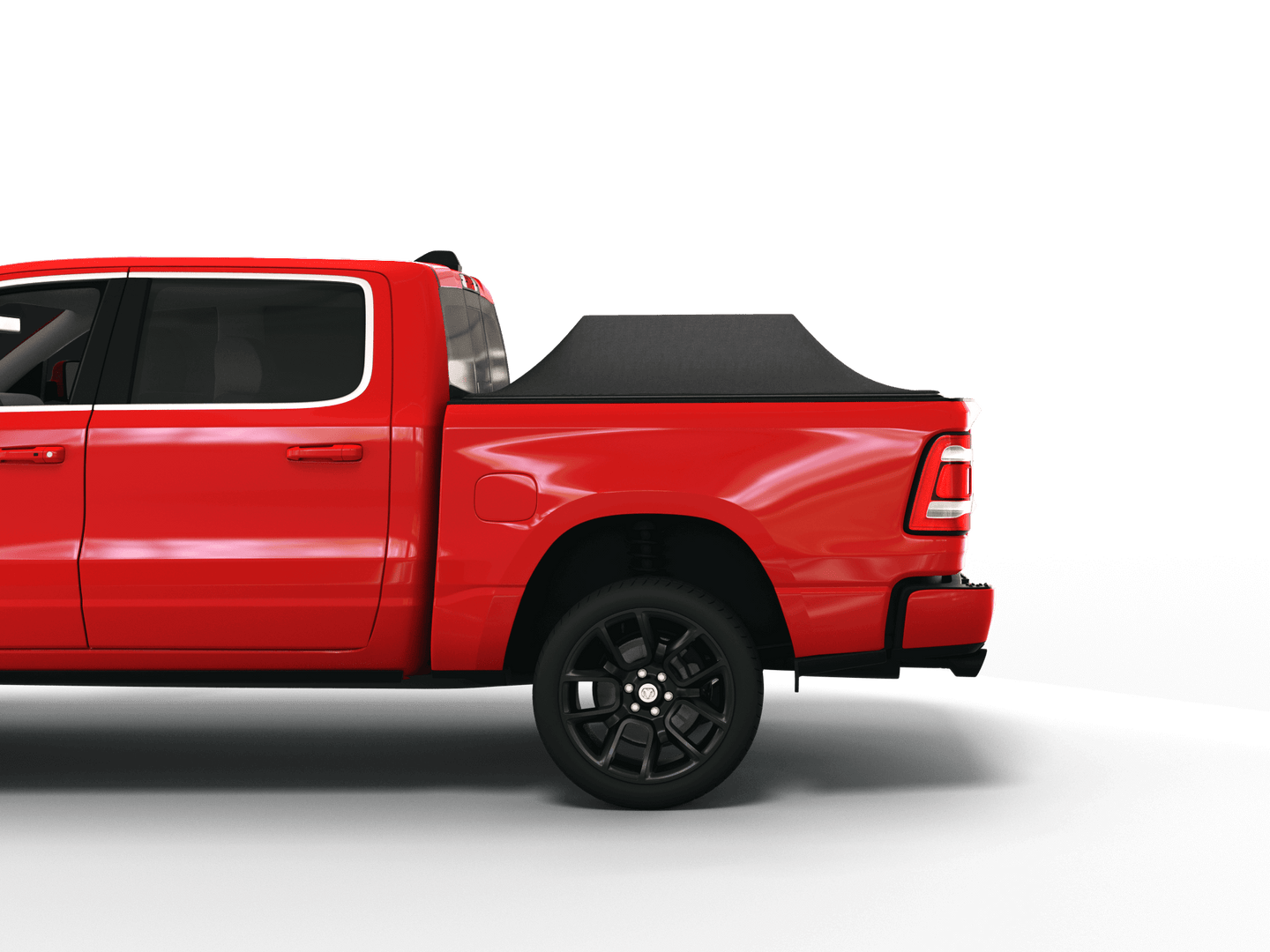 Red Ram 2500 with Sawtooth Stretch tonneau cover expanded over cargo load