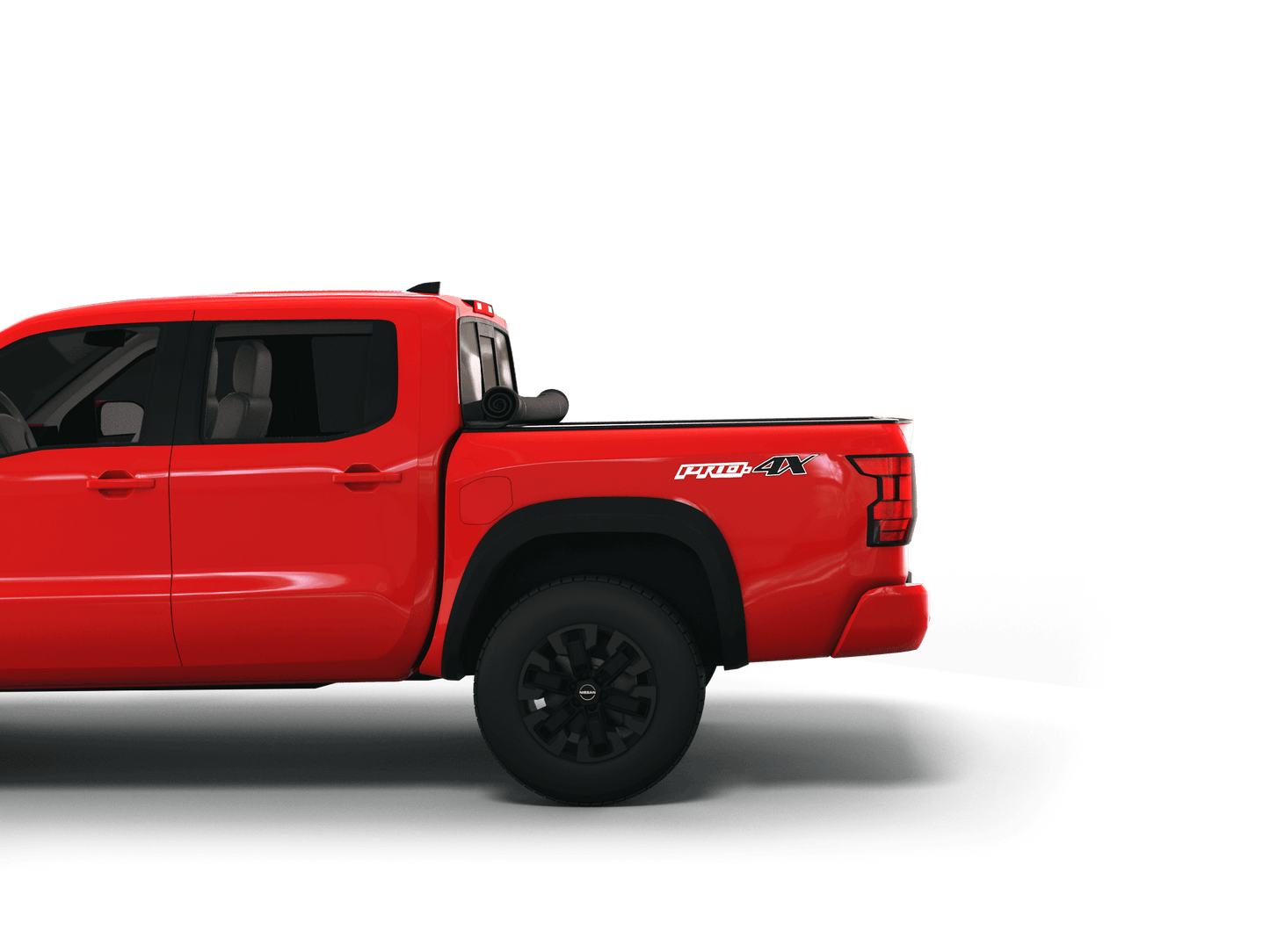 Red Nissan Frontier with Sawtooth Stretch expandable pickup truck bed cover rolled up at cab