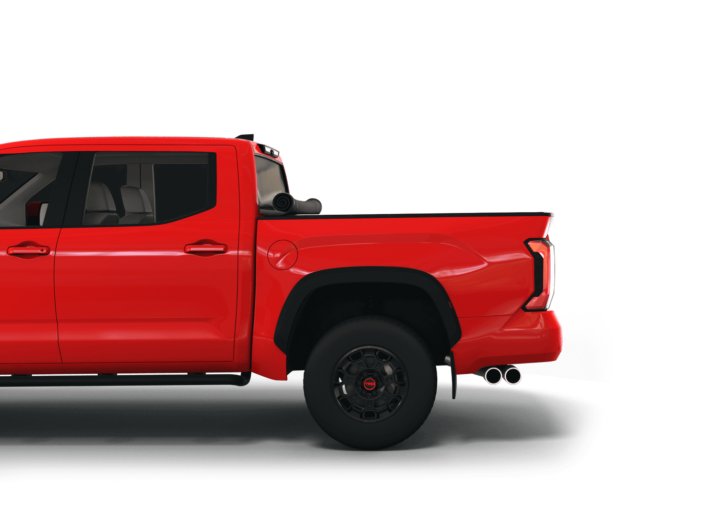 Red Toyota Tundra with Sawtooth Stretch expandable pickup truck bed cover rolled up at cab