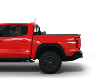 Load image into Gallery viewer, Red 2025 Chevrolet Colorado 6&#39; 2&quot; Bed / GMC Canyon 6&#39; 2&quot; Bed with Sawtooth Stretch expandable pickup truck bed cover rolled up at cab
