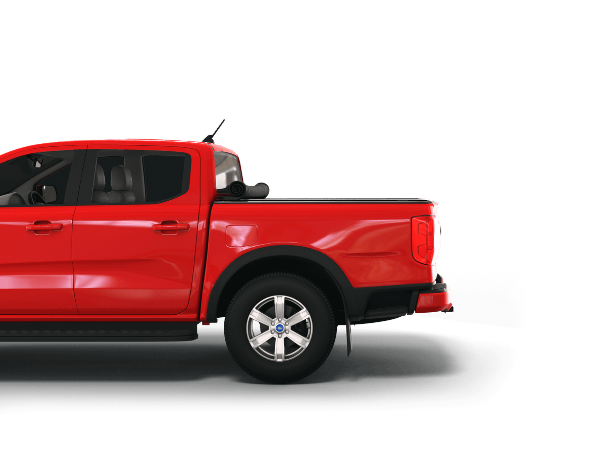 A red Ford pickup truck shown from the rear three-quarter side view, featuring a black Sawtooth STRETCH truck bed cover rolled up and silver multi-spoke alloy wheels, isolated on a white background.