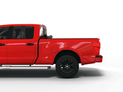 Red Nissan Titan with Sawtooth Stretch expandable pickup truck bed cover rolled up at cab