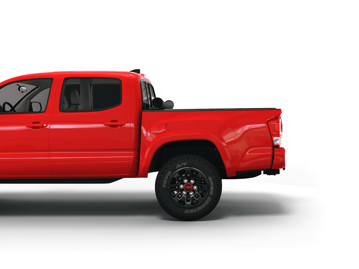 Red Toyota Tacoma with Sawtooth Stretch expandable pickup truck bed cover rolled up at cab