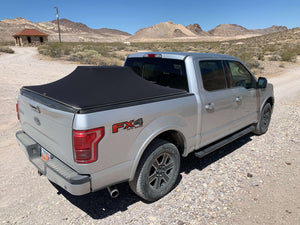 Silver F-150 with flat expandable Sawtooth Stretch tonneau in Rhyolite Nevada