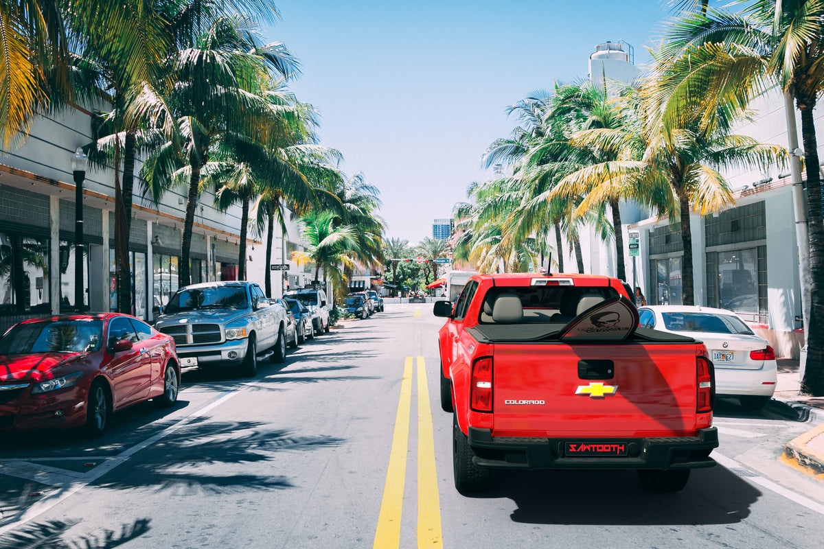 red 2015 2016 2017 2018 2019 2020 2021 chevy colorado 6' 2" bed with surfboard under flat sawtooth stretch truck bed cover red 2015 2016 2017 2018 2019 2020 2021 GMC Canyon 6' 2" bed with surfboard under flat sawtooth stretch tonneau cover