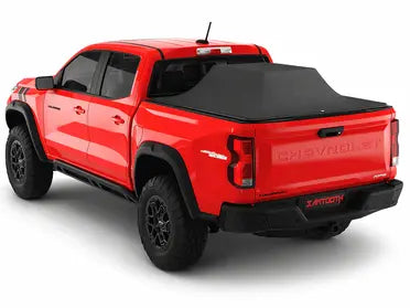 Red Chevrolet truck with a black tonneau cover on a white background