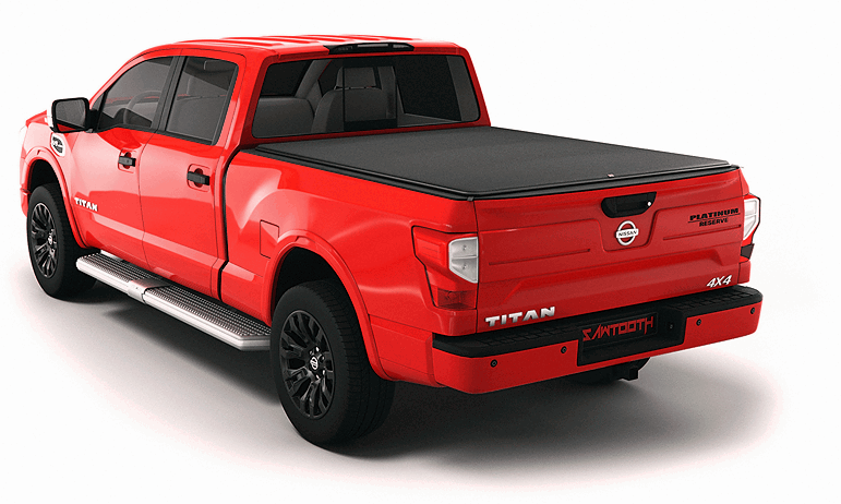 Red Nissan Titan pickup truck with black bed cover