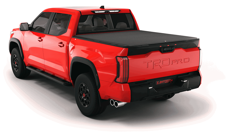 Red Toyota Tundra pickup truck viewed from rear with green cargo case in the truck bed
