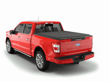Load image into Gallery viewer, Red 2015 Ford F-150 5&#39; 7&quot; Bed with Sawtooth Stretch expandable tonneau cover
