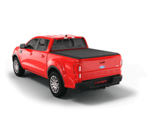 Load image into Gallery viewer, Red 2021 Ford Ranger with flat Sawtooth Stretch expandable tonneau cover
