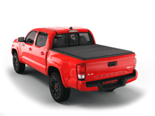 Load image into Gallery viewer, Red 2017 Toyota Tacoma 6&#39; Bed with flat Sawtooth Stretch expandable tonneau cover
