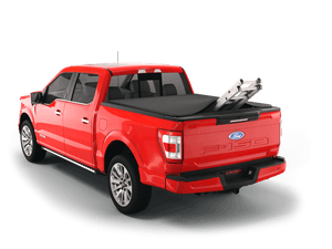 Red 2018 Ford F-150 5' 7" Bed with ladder sticking out of Sawtooth Stretch expandable truck bed cover