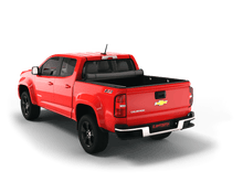 Load image into Gallery viewer, Red 2020 Chevrolet Colorado 6&#39; 2&quot; Bed / GMC Canyon 6&#39; 2&quot; Bed with Sawtooth Stretch expandable soft roll up tonneau cover with ladder and open tailgate 
