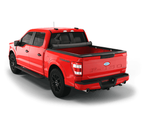 Red 2021 Ford F-150 6' 7" Bed with Sawtooth Stretch expandable tonneau cover rolled up at cab