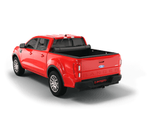 Load image into Gallery viewer, Red 2023 Ford Ranger with Sawtooth Stretch expandable soft roll up tonneau cover with ladder and open tailgate 
