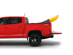 Red 2015 Chevrolet Colorado 5' 2" Bed / GMC Canyon 5' 2" Bed with yellow kayak under sawtooth stretch truck bed cover