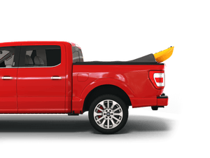 Red 2011 Ford F-150 5' 7" Bed with yellow kayak under sawtooth stretch truck bed cover
