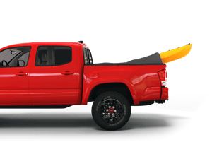 Red 2023 Toyota Tacoma 6' Bed with yellow kayak under sawtooth stretch truck bed cover