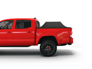 Red 2019 Toyota Tacoma 5' Bed with Sawtooth Stretch tonneau cover expanded over cargo load