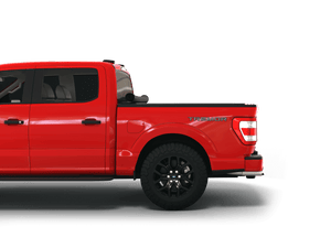 Red 2024 Ford F-150 5' 7" Bed with Sawtooth Stretch expandable pickup truck bed cover rolled up at cab