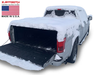 Silver 2004 2005 2006 2007 2008 Ford F-150 5' 7" bed with snow covering sawtooth stretch truck bed cover sawtooth stretch tonneau cover