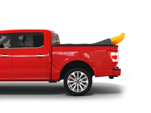 red 2004 2005 2006 2007 2008 Ford F-150 5' 7" bed with yellow kayak under sawtooth stretch truck bed cover sawtooth stretch tonneau cover