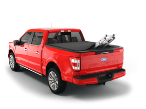 red 2004 2005 2006 2007 2008 Ford F-150 5' 7" bed with ladder sticking out of sawtooth stretch expandable truck bed cover expandable tonneau cover